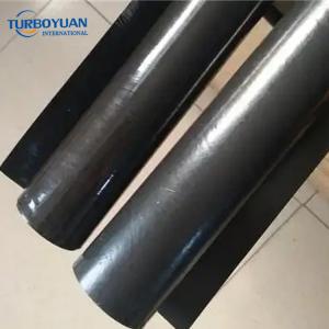 Black builders recycling polythene films in roll under concrete plastic rolls